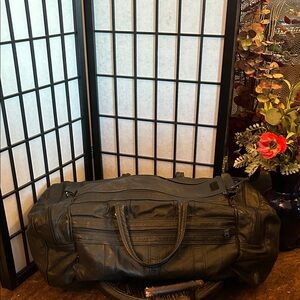 Sleek Black Leather Duffel Bag for Men